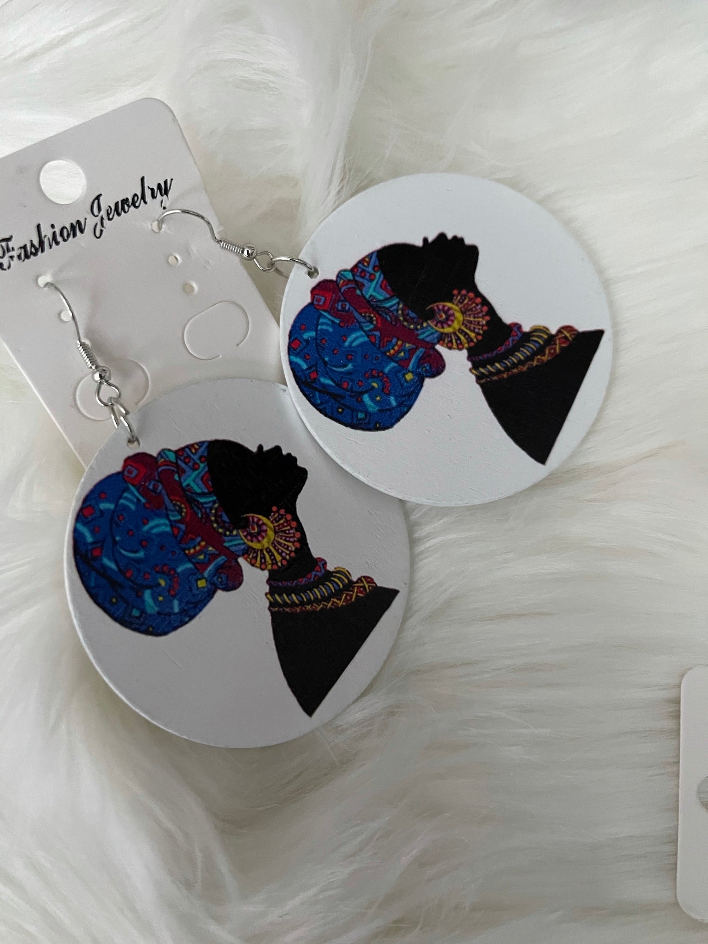 Holding up my Crown Fashion Earrings